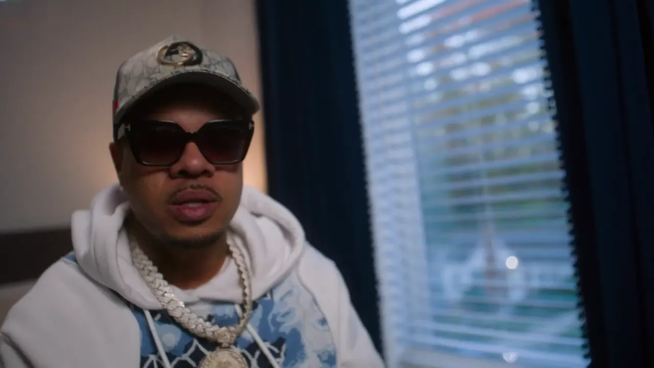Still from BMG Clicc, Flashing Lights music video