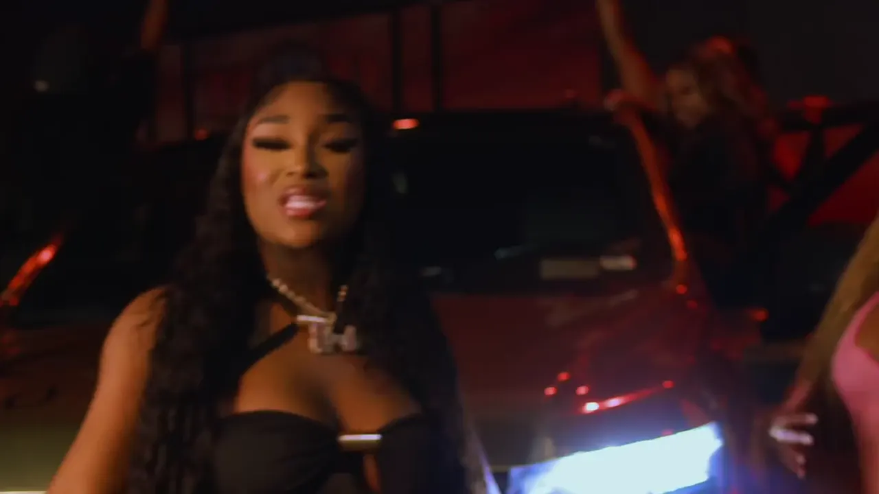 Still from Charlie Sloth ft. Erica Banks, Lick It music video