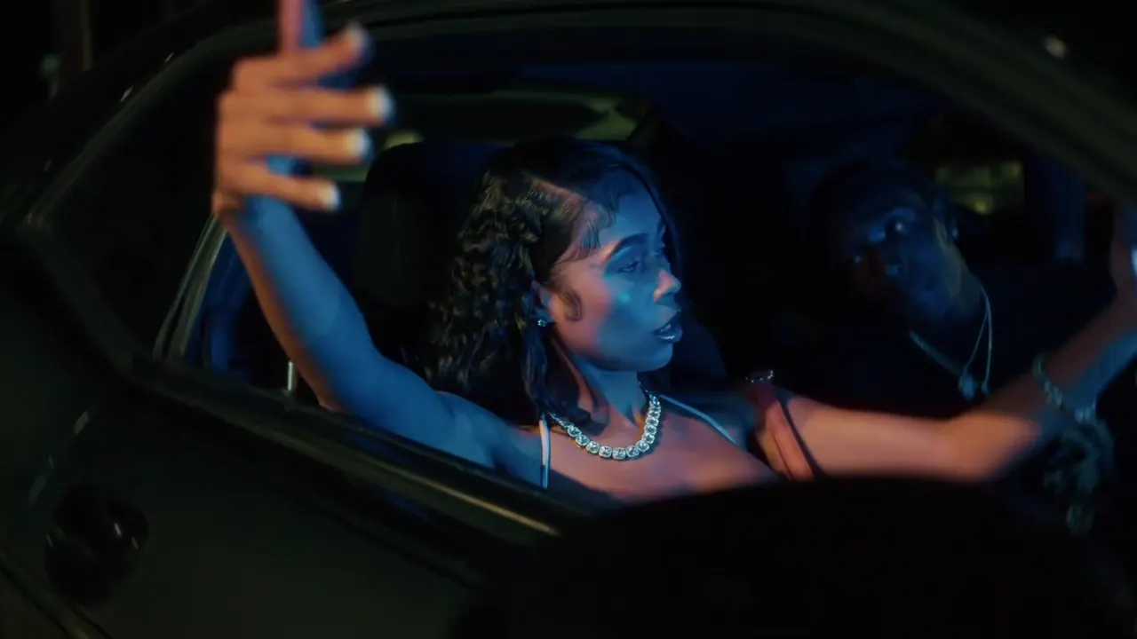 Still from Rea1Zay ft. Stori & Hoodie2X, Manifesting music video